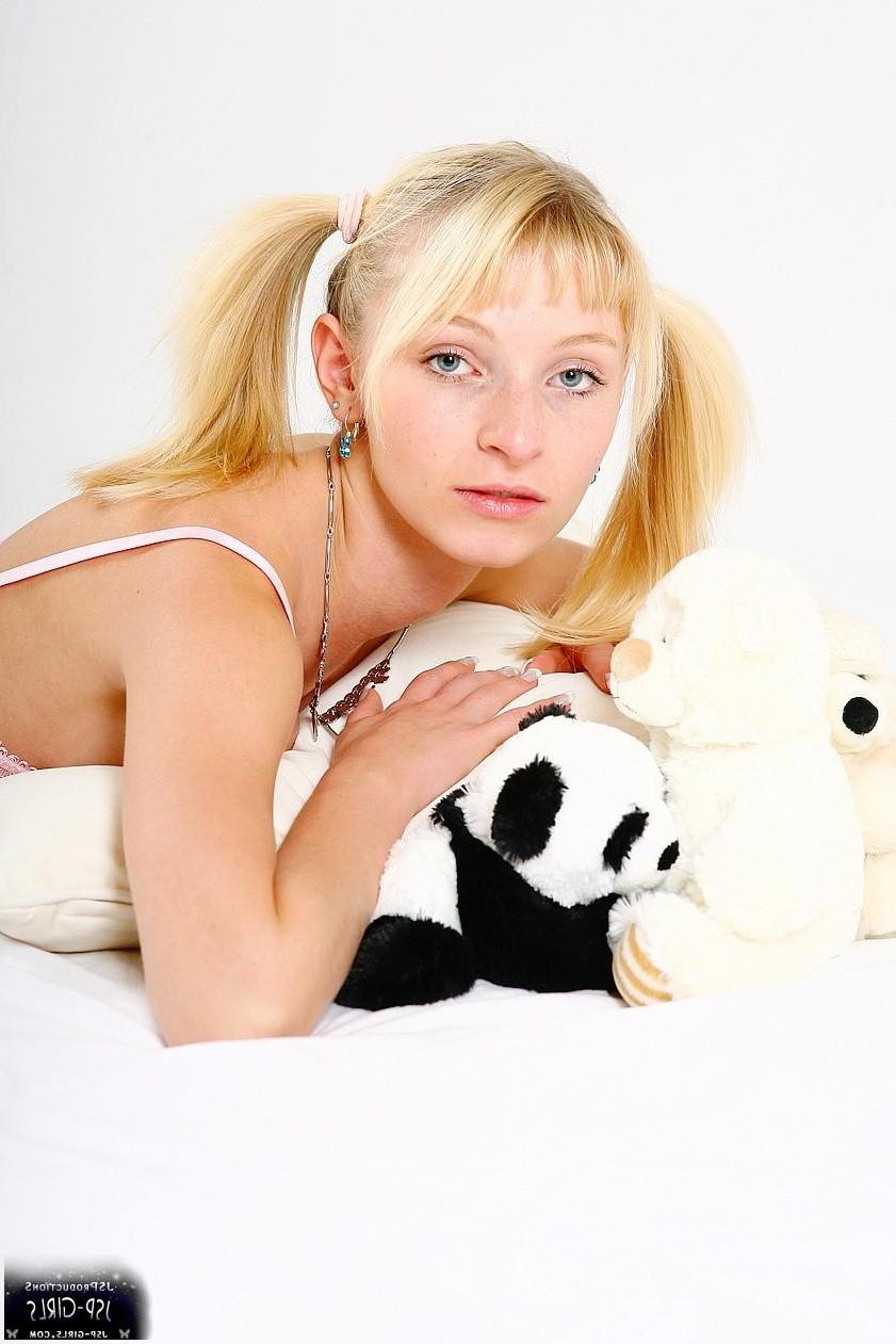 16P Pictures of german girl Justine teasing in white nylons
