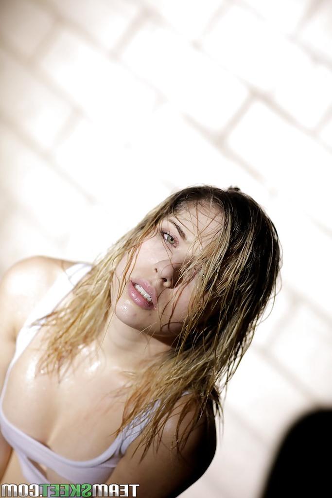 16P Voluptuous teen in wet clothes Lia Lor revealing her perky tits