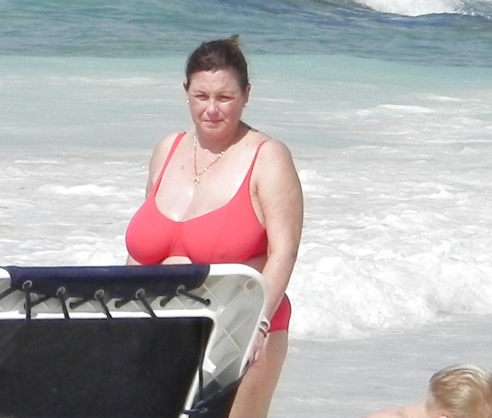 25P Mature boobs beach