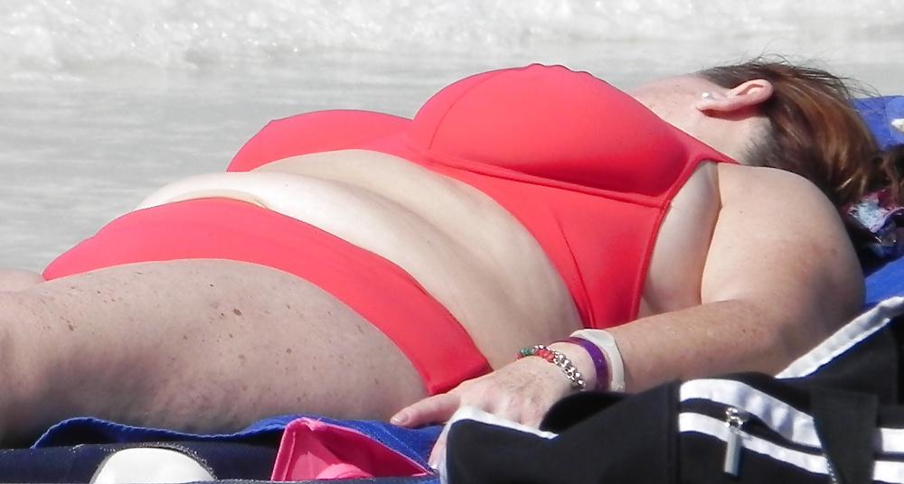 25P Mature boobs beach