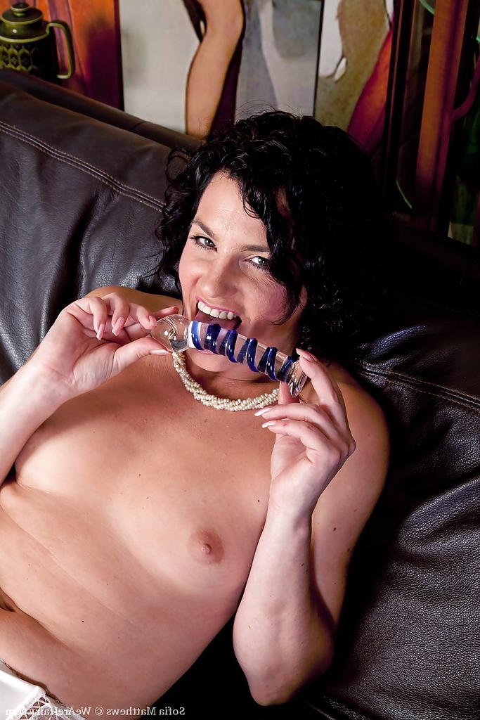 16P Hot MILF Sofia Matthews masturbating her cunt with a glass toy
