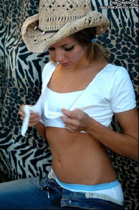 16P Sexy cowgirl Jordan Capri pulls down her jeans