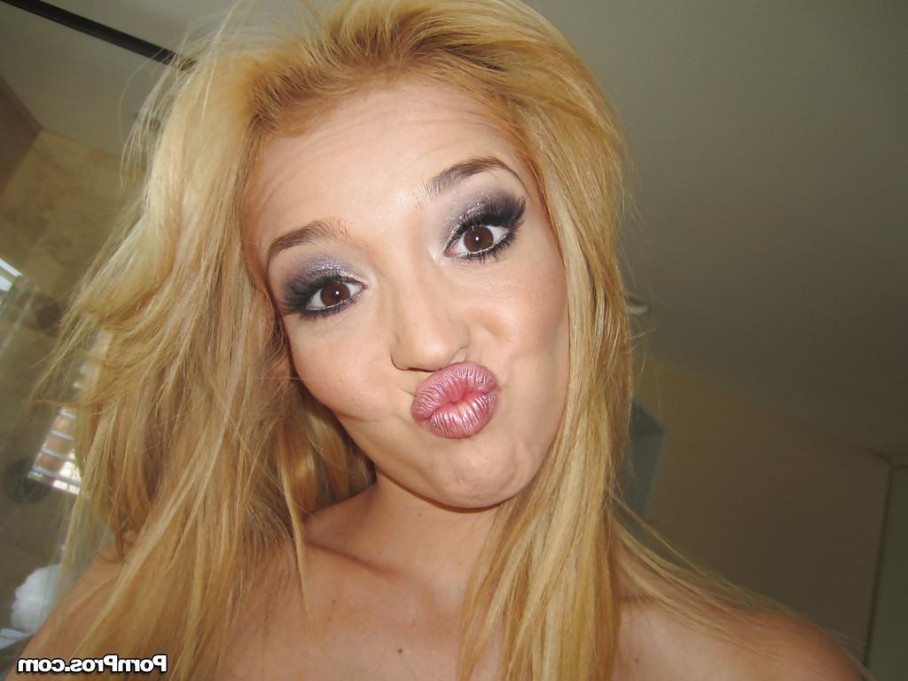 16P Foxy blonde with tiny tits Tiffany Fox stripping and spreading her legs