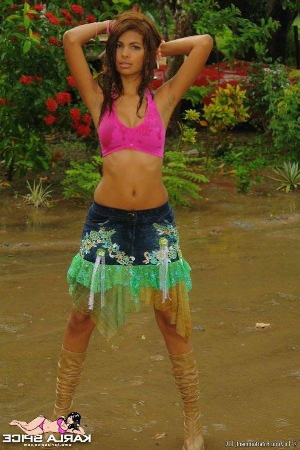 15P Pictures of teen model Karla Spice stripping to her boots and panties