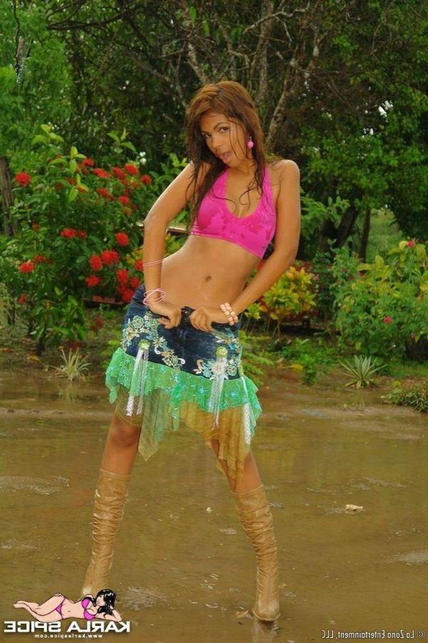 15P Pictures of teen model Karla Spice stripping to her boots and panties