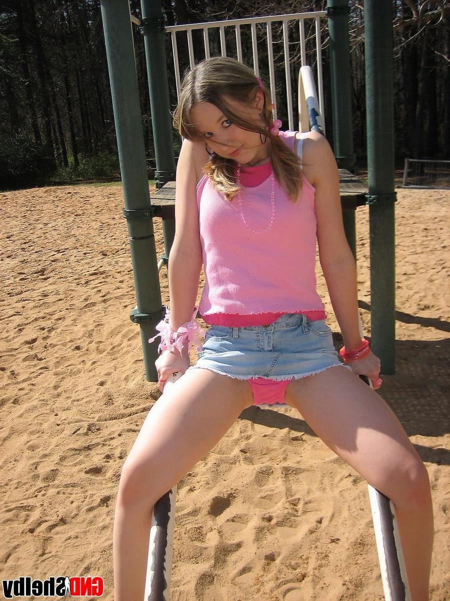 12P Petite teen Shelby isnt shy as she flashes her pussy and shows off her tight ass at the playground