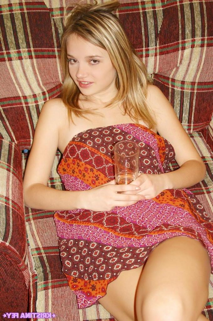 15P Pictures of Kristina Fey showing her tits in bed