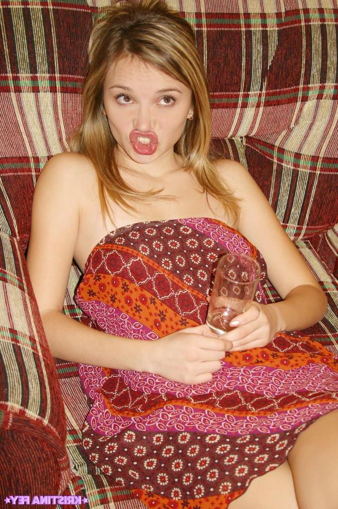 15P Pictures of Kristina Fey showing her tits in bed