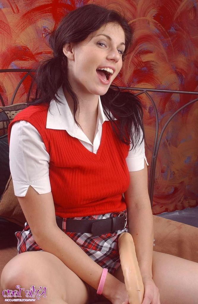 15P Pictures of a schoolgirl masturbating with a massive dildo