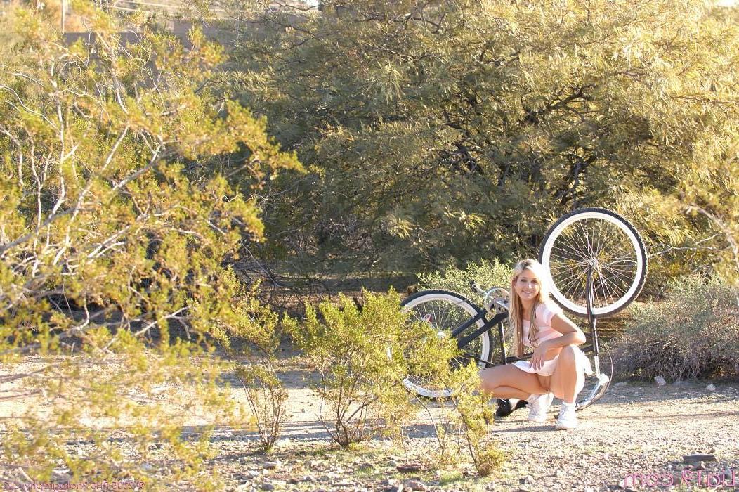 19P Pics of Lia 19 showing her pussy while on a bike ride