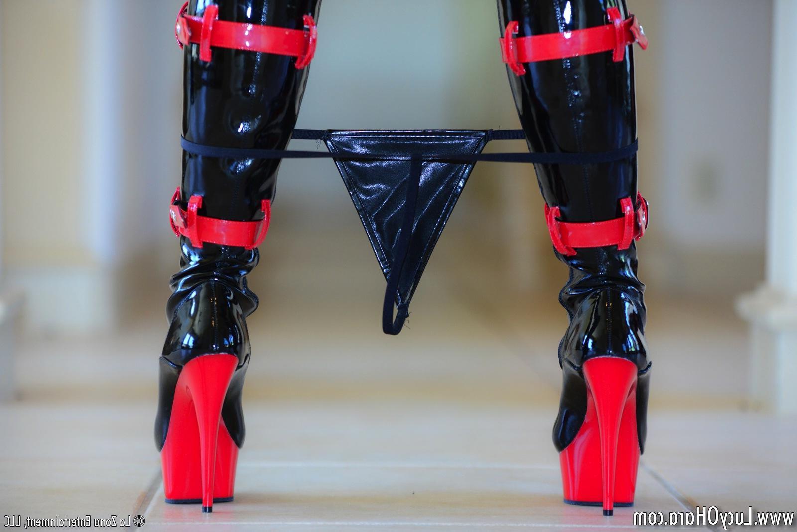 15P Lucy Ohara wears killer leather knee high boots in her sexy dominatrix outfit