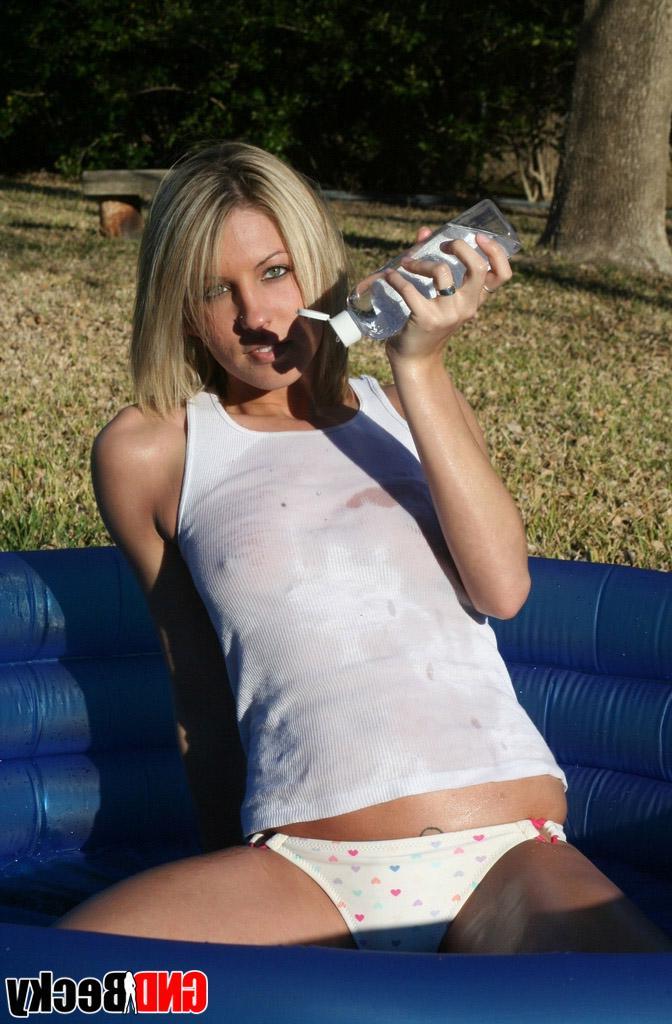 12P Girl next door Becky is not shy as she sprays babyoil all over her perky tits outdoors