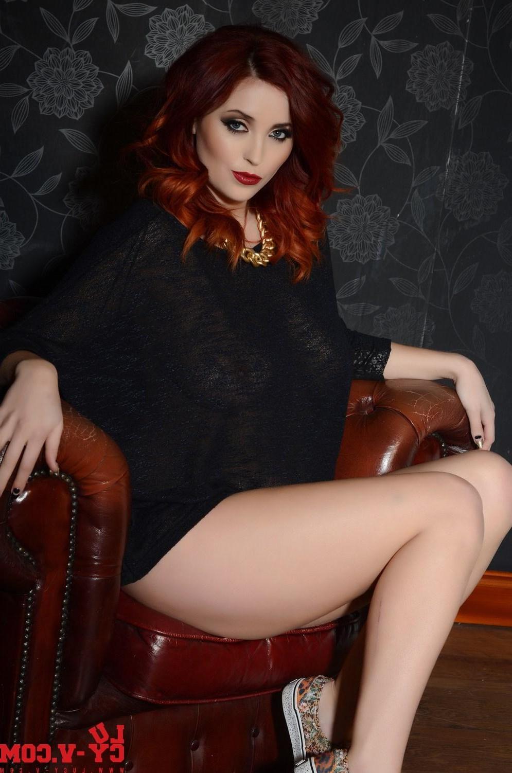 16P Busty babe Lucy V shows you her round natural boobs