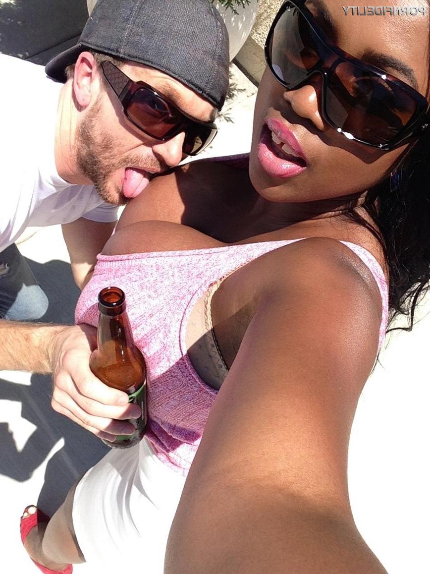 16P Busty ebony pornstar Maserati XXX shows off her big juggs in candids