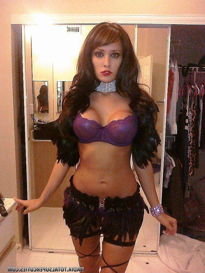 20P Pictures of teen cutie Nadia showing her big tits