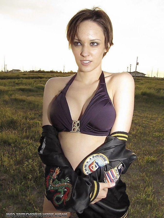 20P Pictures of teen star Nadia showing her big tits
