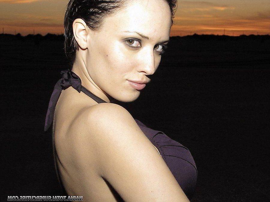 20P Pictures of teen star Nadia showing her big tits