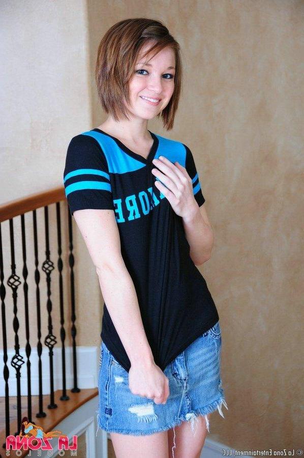15P Rachel is one petite sports fan that strips down to show her support