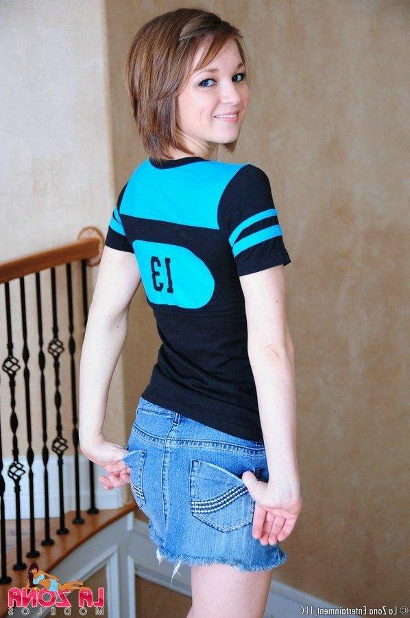 15P Rachel is one petite sports fan that strips down to show her support