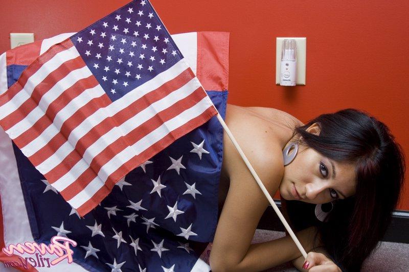 20P Pictures of Raven Riley wrapped up in American flags