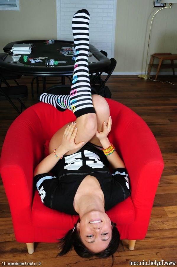 15P Pictures of Taylor Lain teasing in striped socks and panties