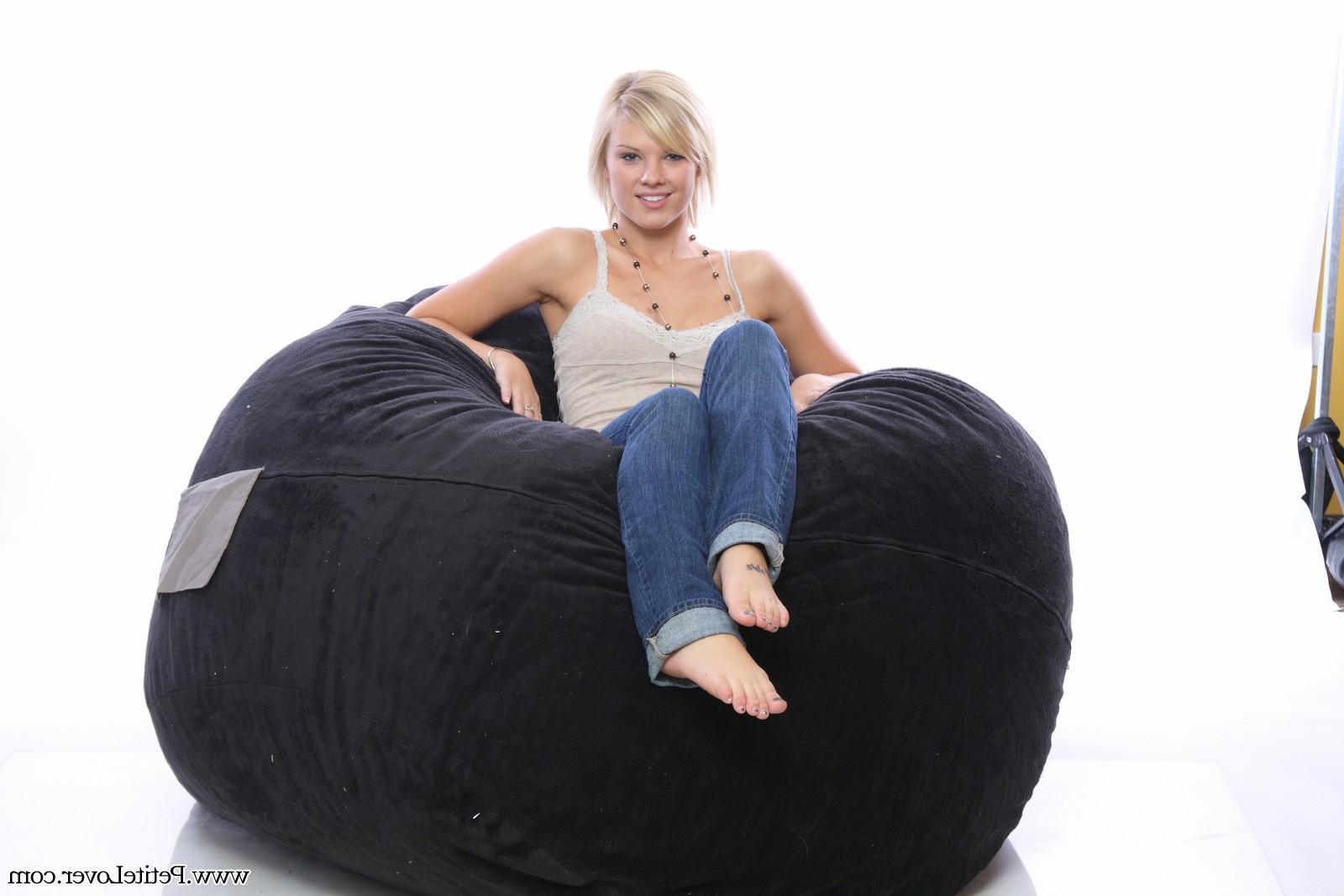 16P Petite blonde girl Tiffany teases on a bean bag
