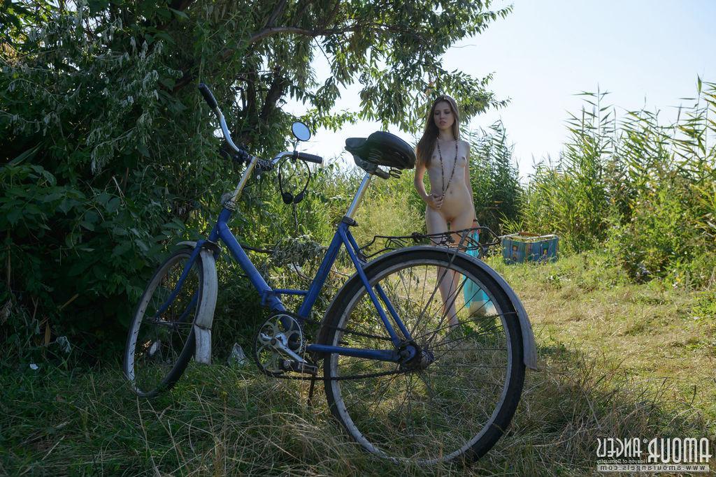 20P Hot teen Catalina strips naked with her bicycle