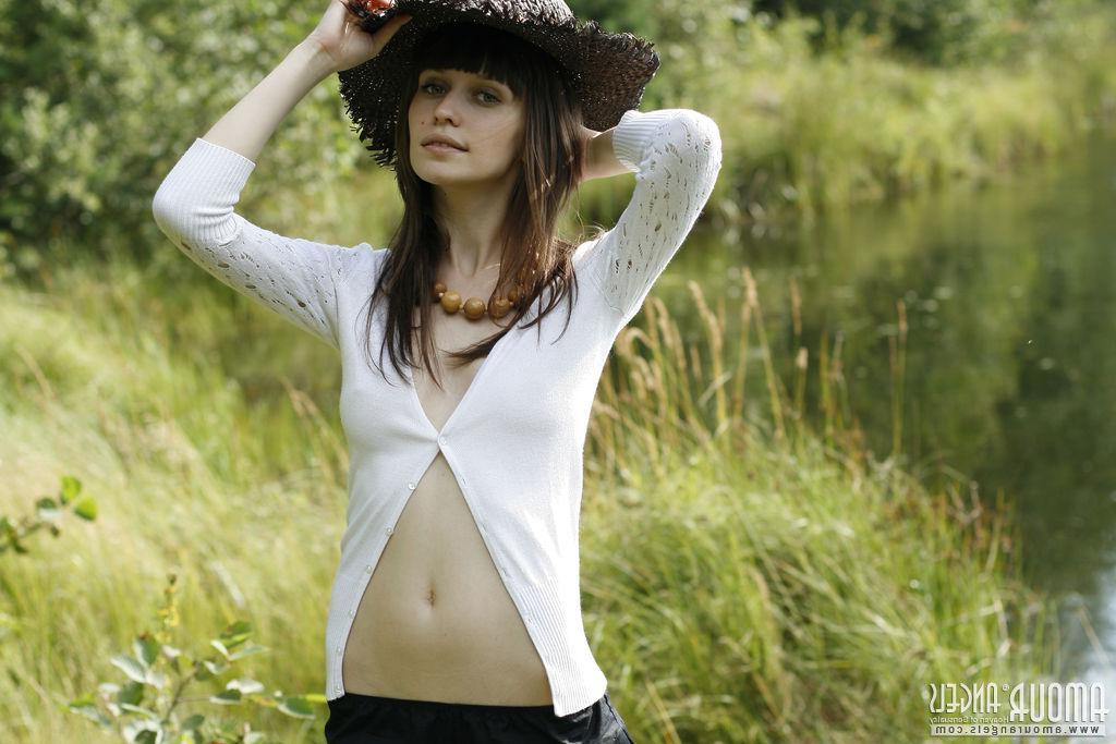 20P Brunette model Lena strips naked for you by the river