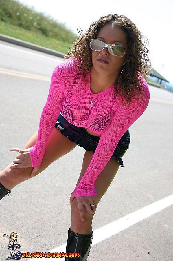 20P Pictures of teen girl Jade teasing in a pink top and boots