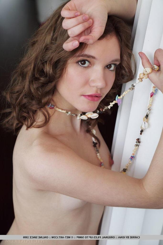 18P Brunette teen Carrie gets naked for you on the floor