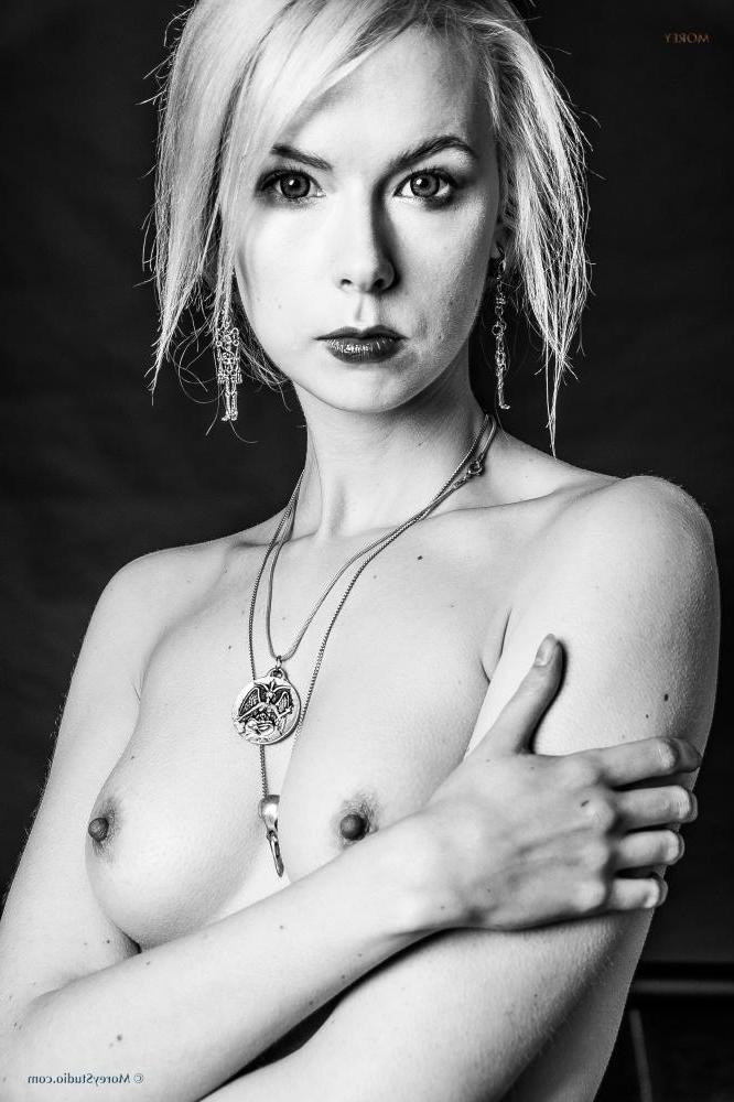 11P Blonde babe Magdalene shows off her tight body in black and white