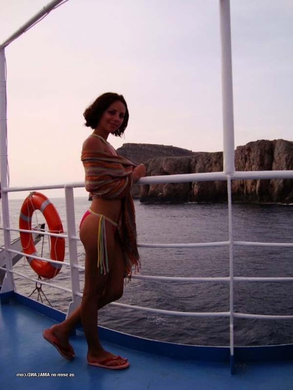 16P Pictures of a hot brunette teen showing off in a bikini