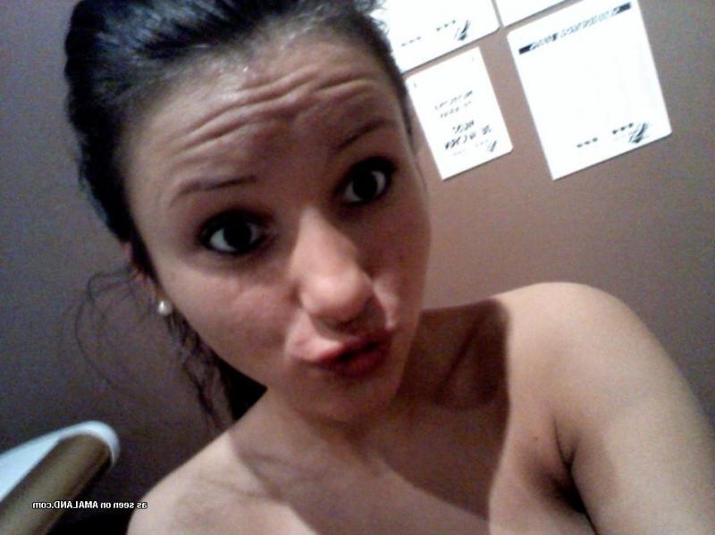 15P Brunette hottie showing off her smoothly shaven snatch