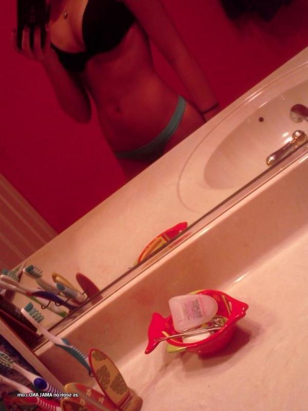 15P Brunette hottie showing off her smoothly shaven snatch