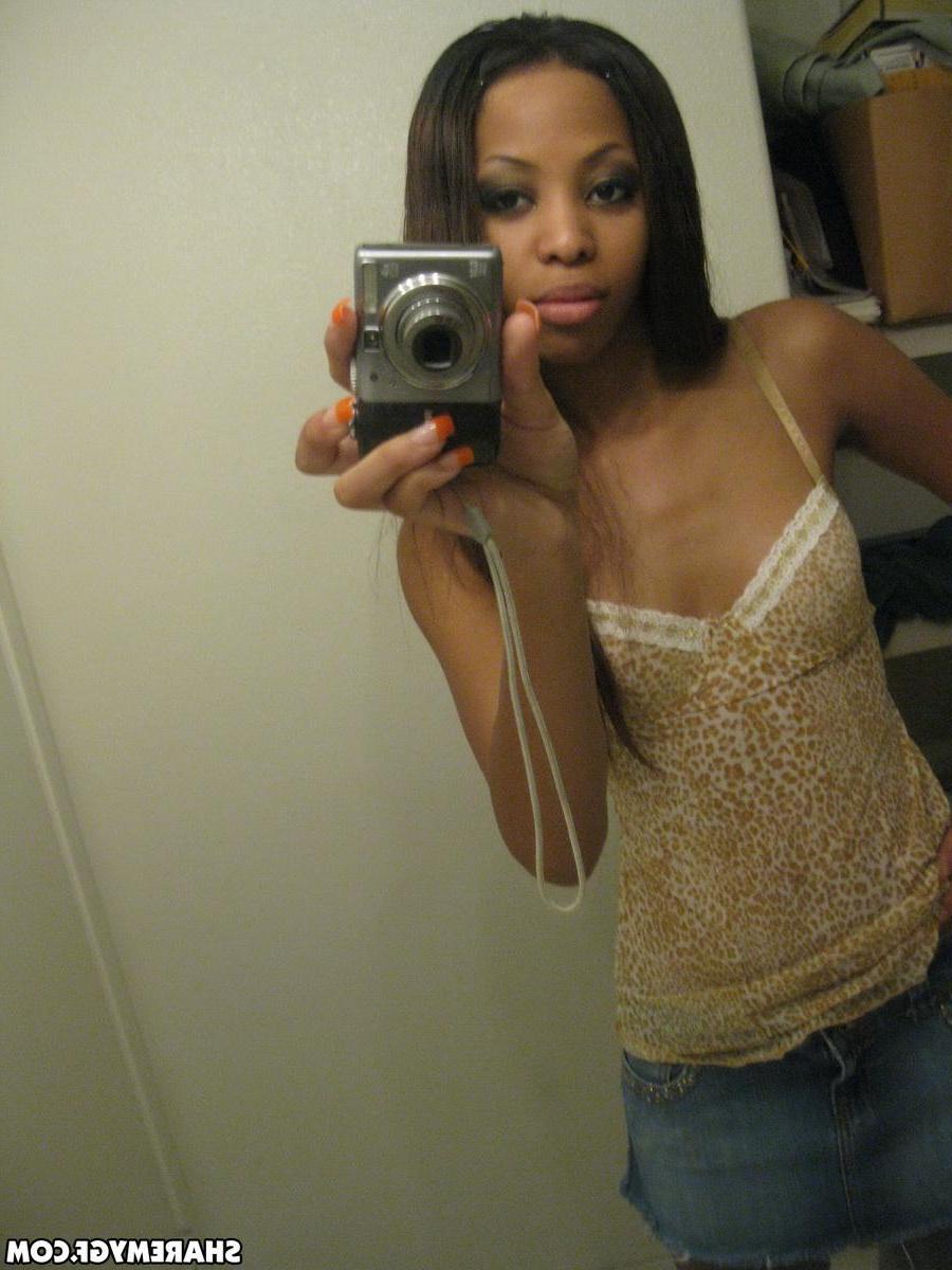 12P Sexy black girlfriend shows off her perky tits in selfshot mirror pics