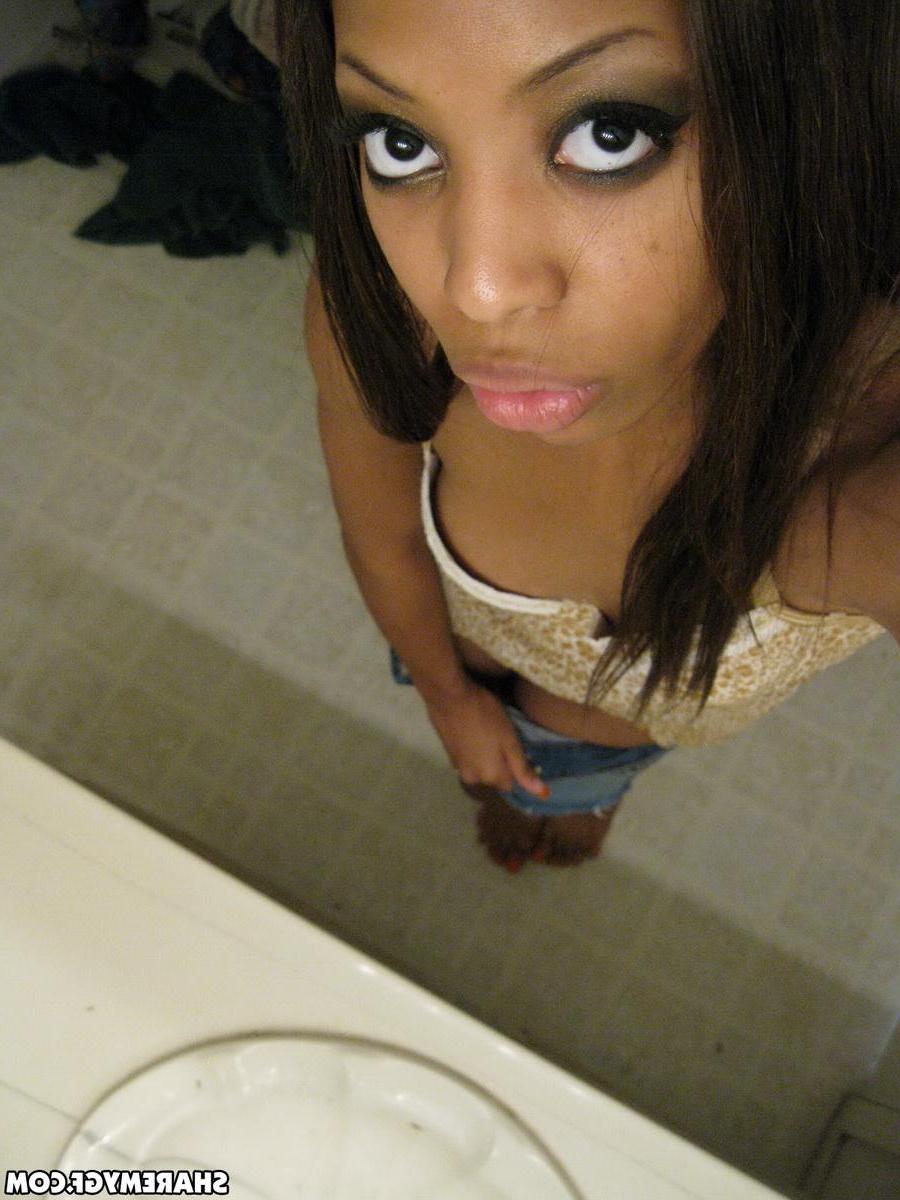 12P Sexy black girlfriend shows off her perky tits in selfshot mirror pics