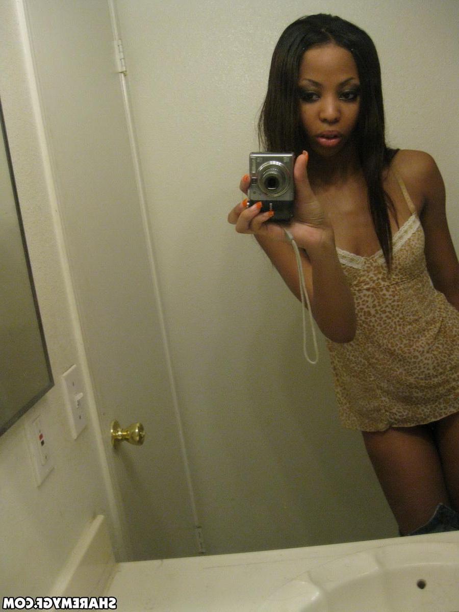 12P Sexy black girlfriend shows off her perky tits in selfshot mirror pics