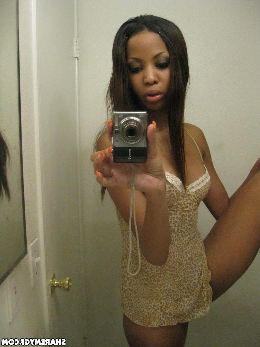 12P Sexy black girlfriend shows off her perky tits in selfshot mirror pics