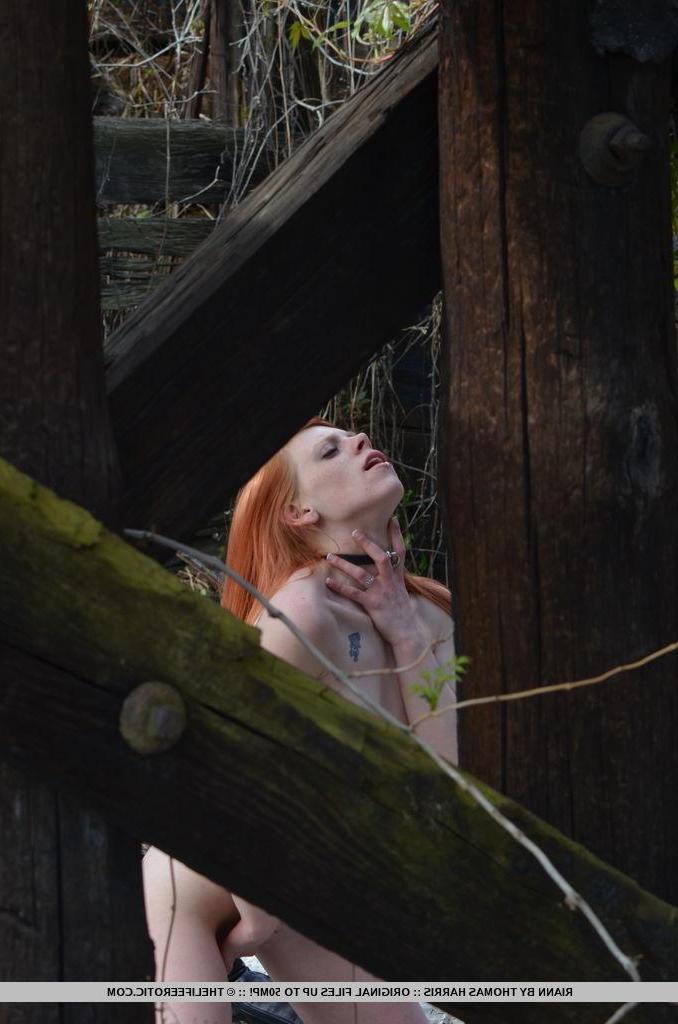 16P Redhead teen Riann strips down to her boots outside