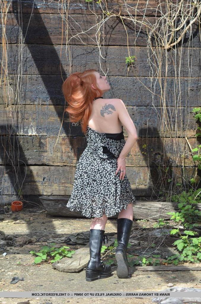 16P Redhead teen Riann strips down to her boots outside