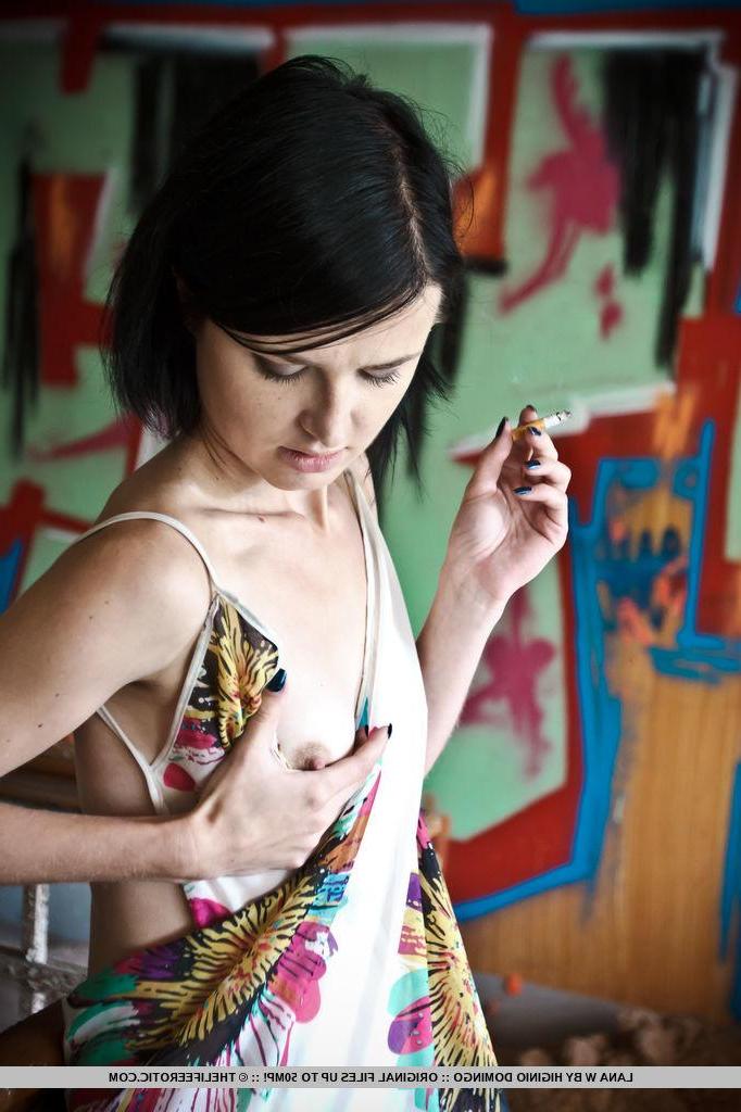 16P Hot model Lana W smokes a cigarette and fondles her tight pussy