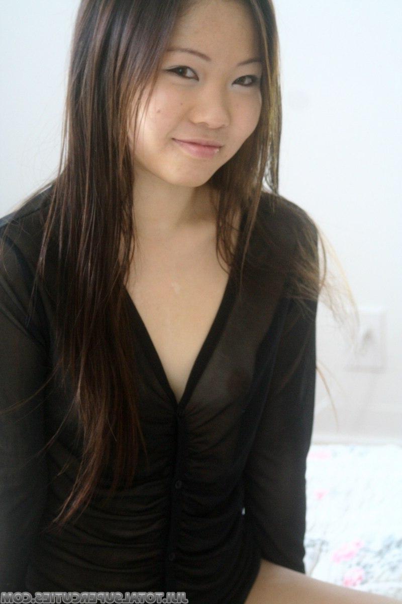 20P Pictures of an asian teen showing you her tits