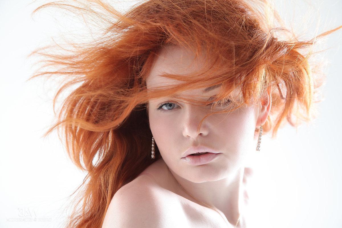 16P Beautiful redhead Barbara Babeurre strips out of her white dress in the studio