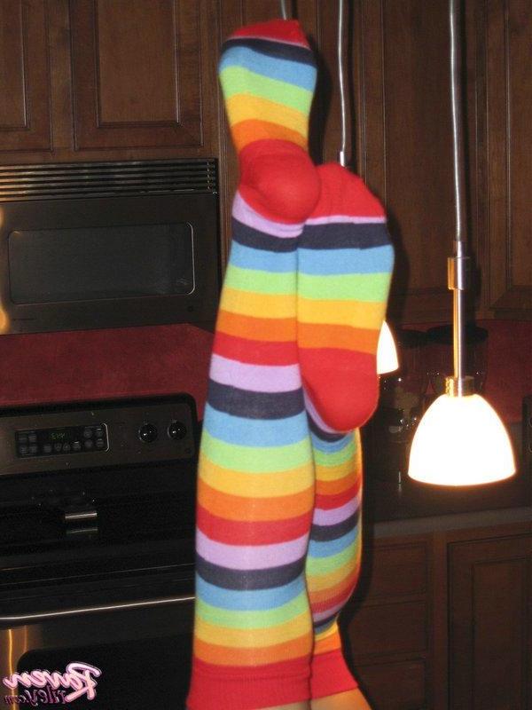 20P Pictures of teen slut Raven Riley masturbating in long striped socks