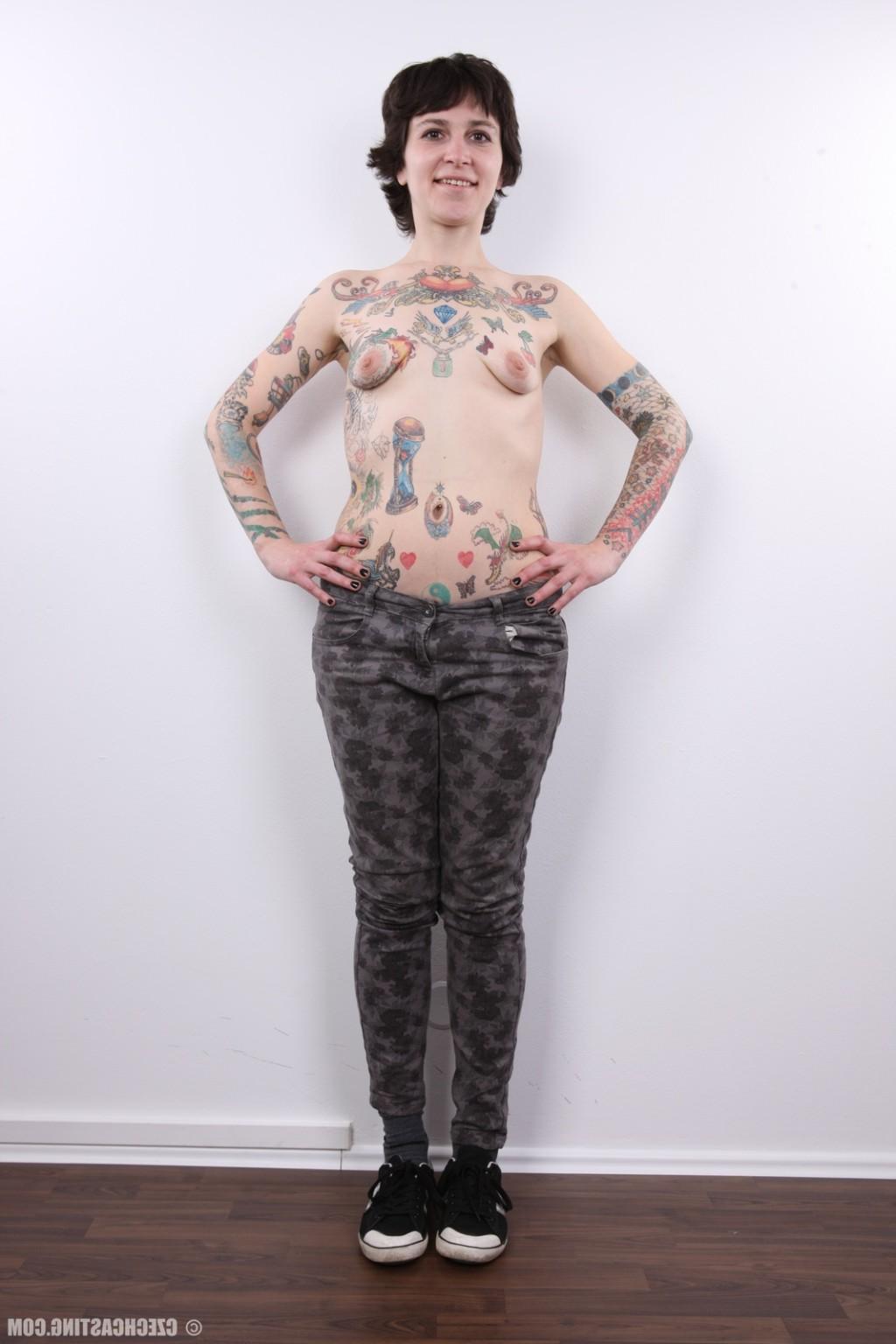 14P Mature tattooed slut poses