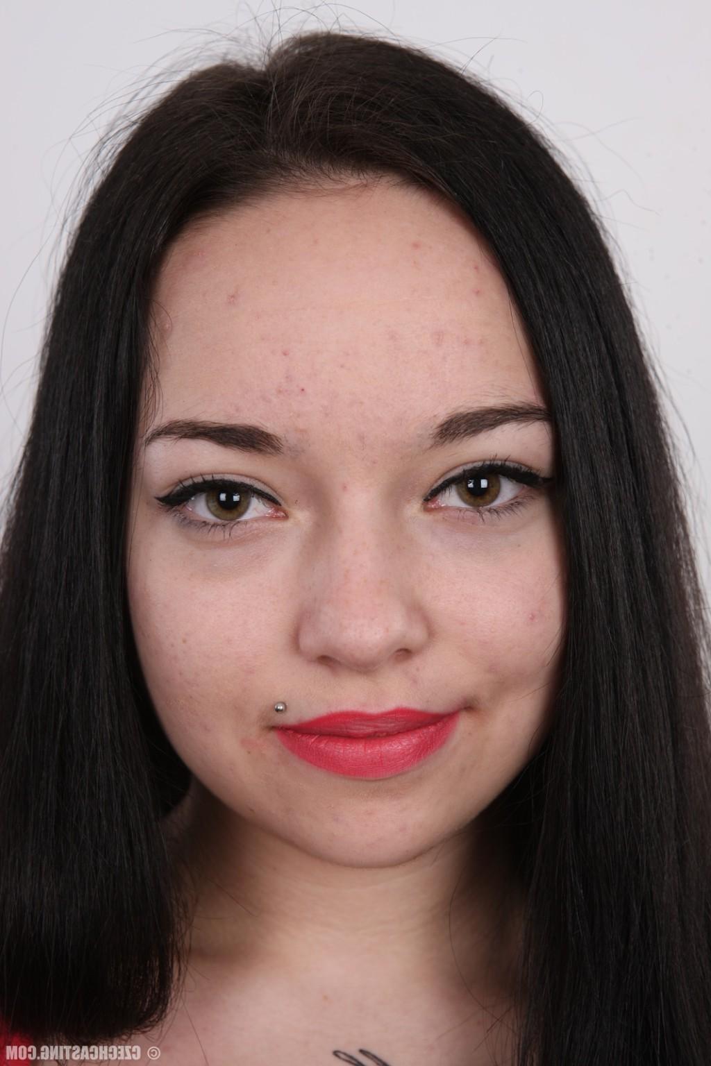 17P Petite brunette poses naked