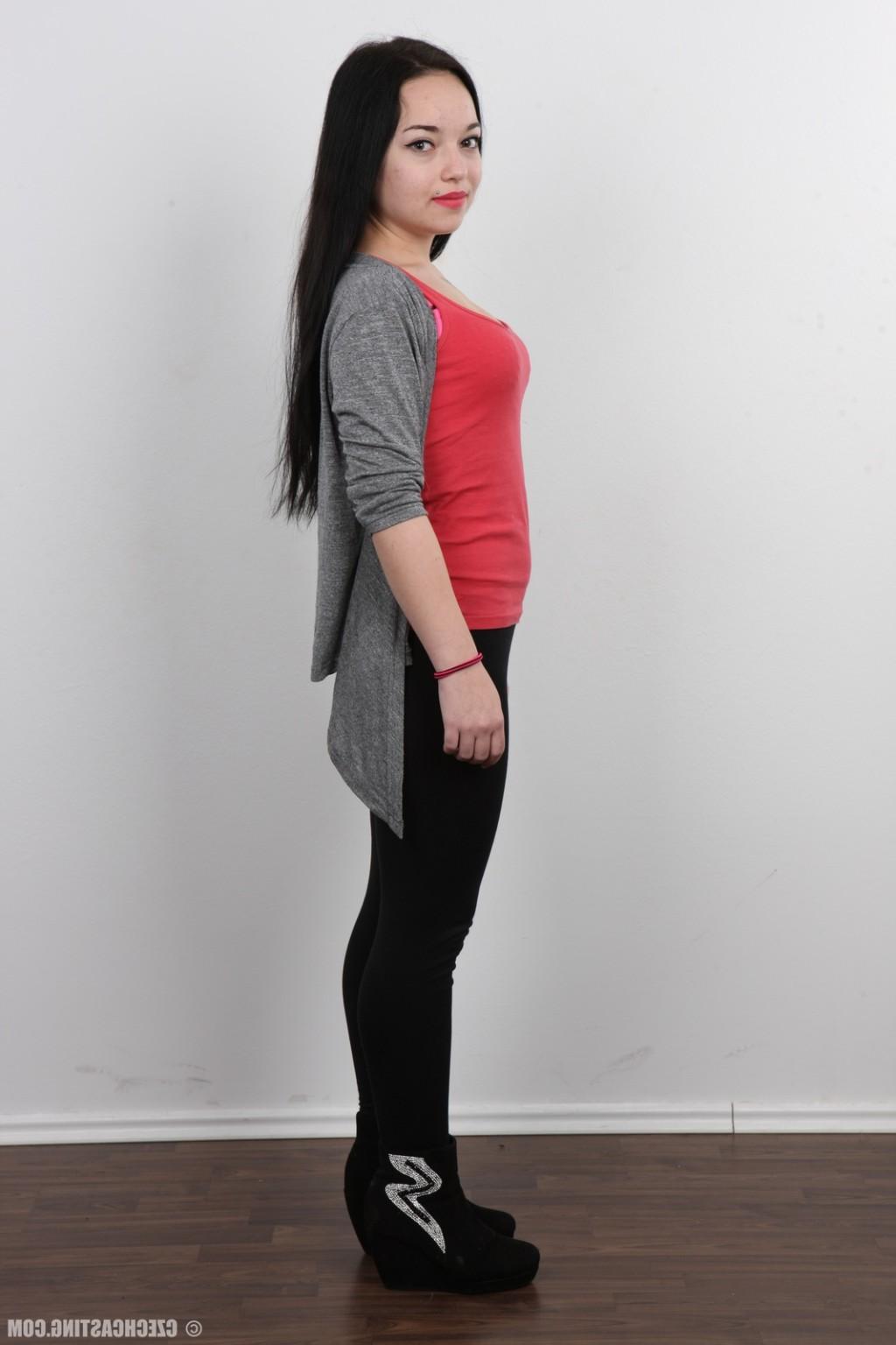 17P Petite brunette poses naked