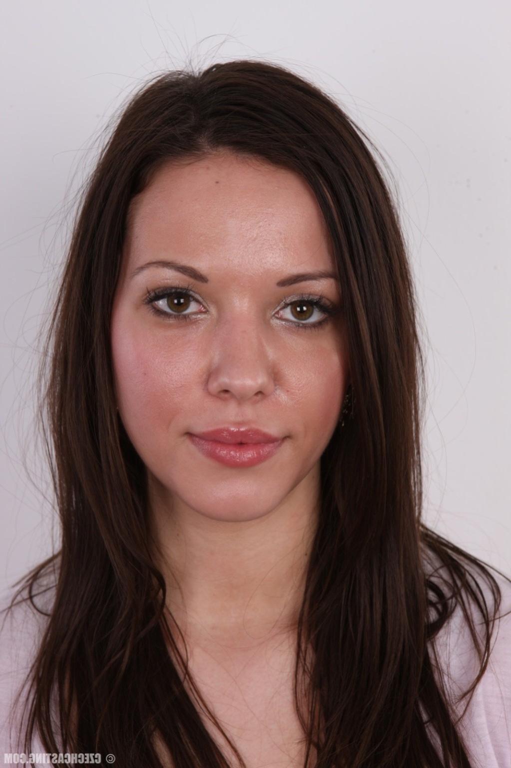 17P Lovely tattooed brunette posing
