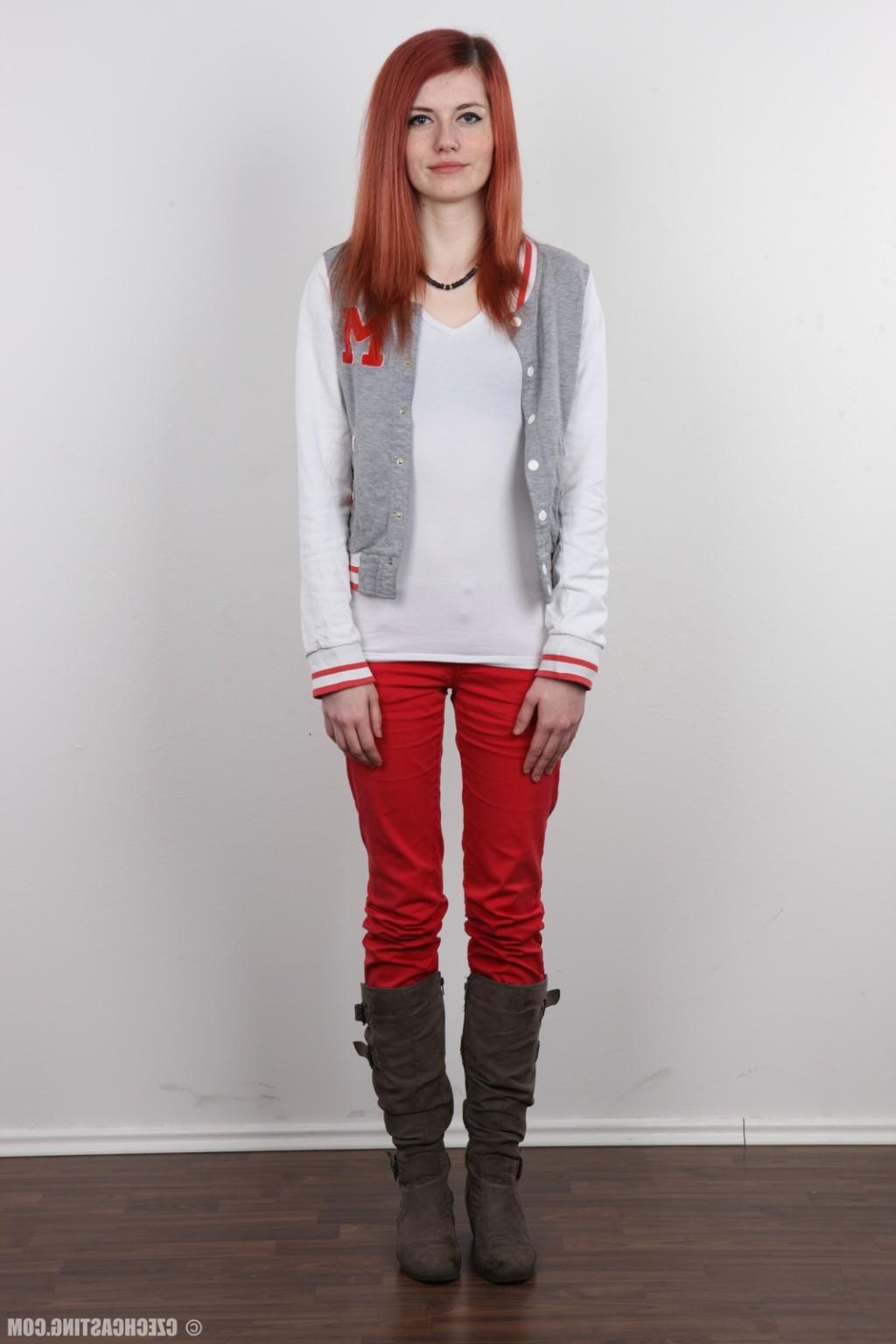 17P Petite redhead teen poses