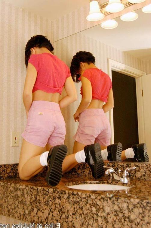 14P Tiny tits teen eriko inserts dildo up her snatch